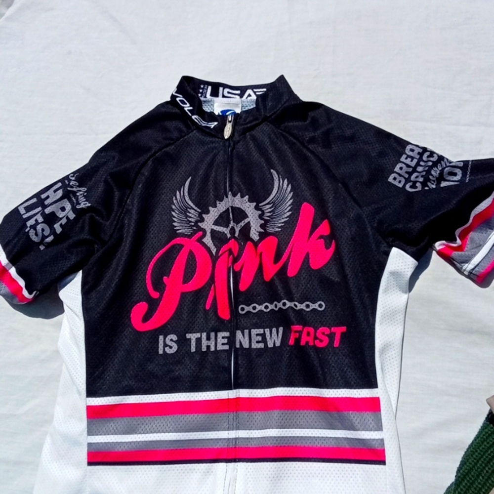 Cycling jersey by PINK SIZE LARGE CUTE PINK COLORED PRINT AND BLACK ON FRONT